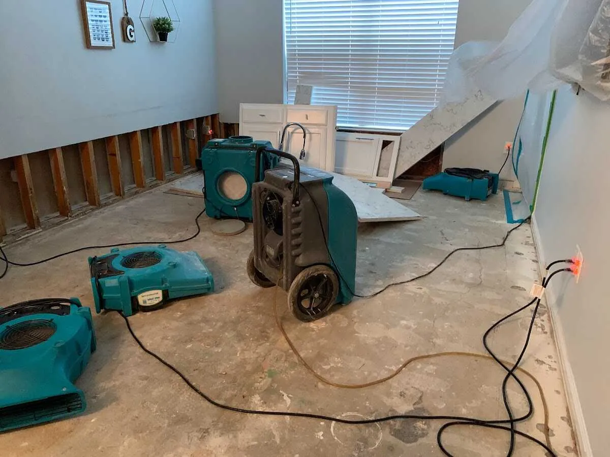Dehumidifier in flood-cut room for Water Damage Restoration in Harrisville